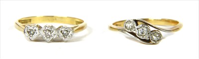 Lot 12 - A gold three stone diamond ring