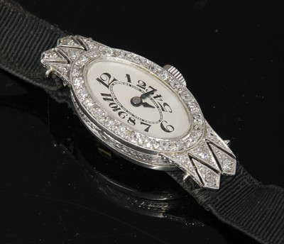 Lot 118 - A ladies' Art Deco diamond set mechanical cocktail watch, c.1925