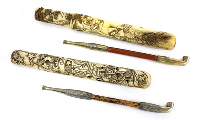 Lot 35 - Two Japanese stag antler kiseruzutsu with kiseru