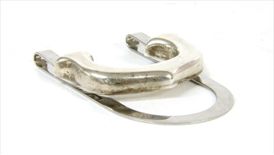 Lot 213 - A stainless steel and sterling silver C de Cartier money clip