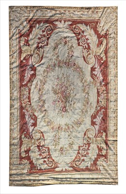 Lot 675 - A large Aubusson needlepoint carpet