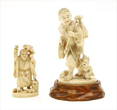 Lot 227 - Two Japanese ivory okimono