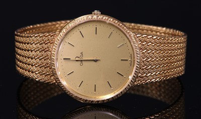 Lot 382 - A gentlemen's 18ct gold Omega quartz bracelet watch