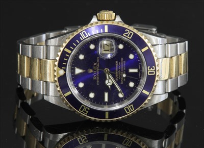 Lot 388 - A gentlemen's bi-colour Rolex 'Oyster Perpetual Submariner' automatic bracelet watch, c.2004