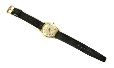 Lot 194 - A gentlemen's 9ct gold Garrard automatic strap watch, c.1970
