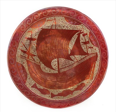 Lot 151 - An earthenware lustre charger by Maw & Co, Jackfield