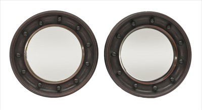 Lot 96 - A pair of small mahogany-framed convex wall mirrors