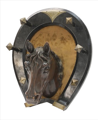 Lot 881 - A large carved wood and ebonised hat/whip rack