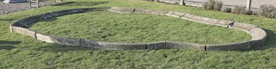Lot 295 - A large sectioned limestone pond surround