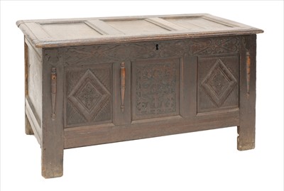 Lot 939 - A triple panelled oak coffer