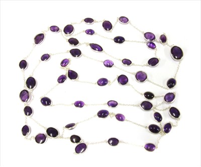 Lot 149 - A silver amethyst long chain