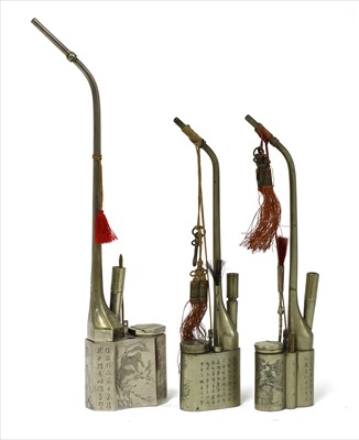 Lot 59 - A collection of three Chinese water pipes