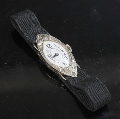 Lot 116 - A ladies' 18ct white gold diamond set cocktail strap watch, c.1928