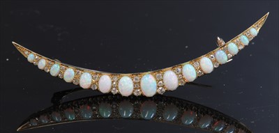 Lot 67 - A late Victorian gold opal and diamond crescent brooch, c.1890