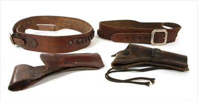 Lot 286 - Three leather holsters and two belts