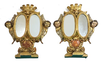 Lot 648 - A pair of giltwood reliquary stand mirrors