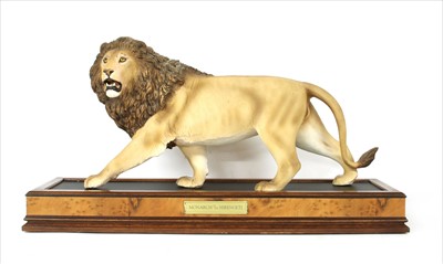 Lot 318 - A collection of four Franklin Mint ceramic model wild cats