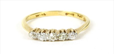 Lot 10 - A gold five stone diamond ring