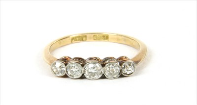 Lot 9 - A gold five stone diamond ring