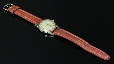 Lot 370 - A gentlemen's gold Wittnauer 'Revue' mechanical strap watch, c.1955-1965