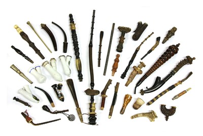 Lot 225 - A collection of pipe bowls and shafts