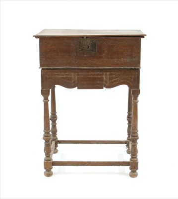 Lot 528 - An oak bible box on stand