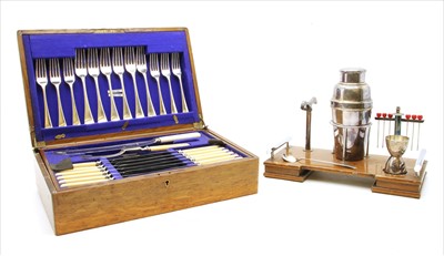 Lot 335 - An Art Deco chromium plated and oak cocktail set
