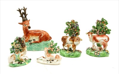 Lot 356 - A pair of Derby bocage figures of cattle