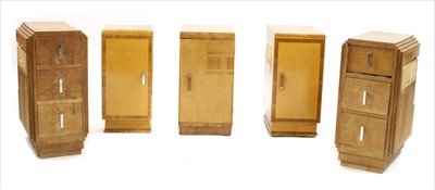 Lot 868 - A pair of birdseye maple and walnut bedside cupboards