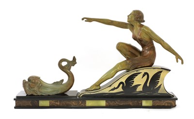 Lot 327 - An Art Deco patinated spelter centrepiece of a lady