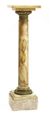 Lot 333 - A green onyx pedestal