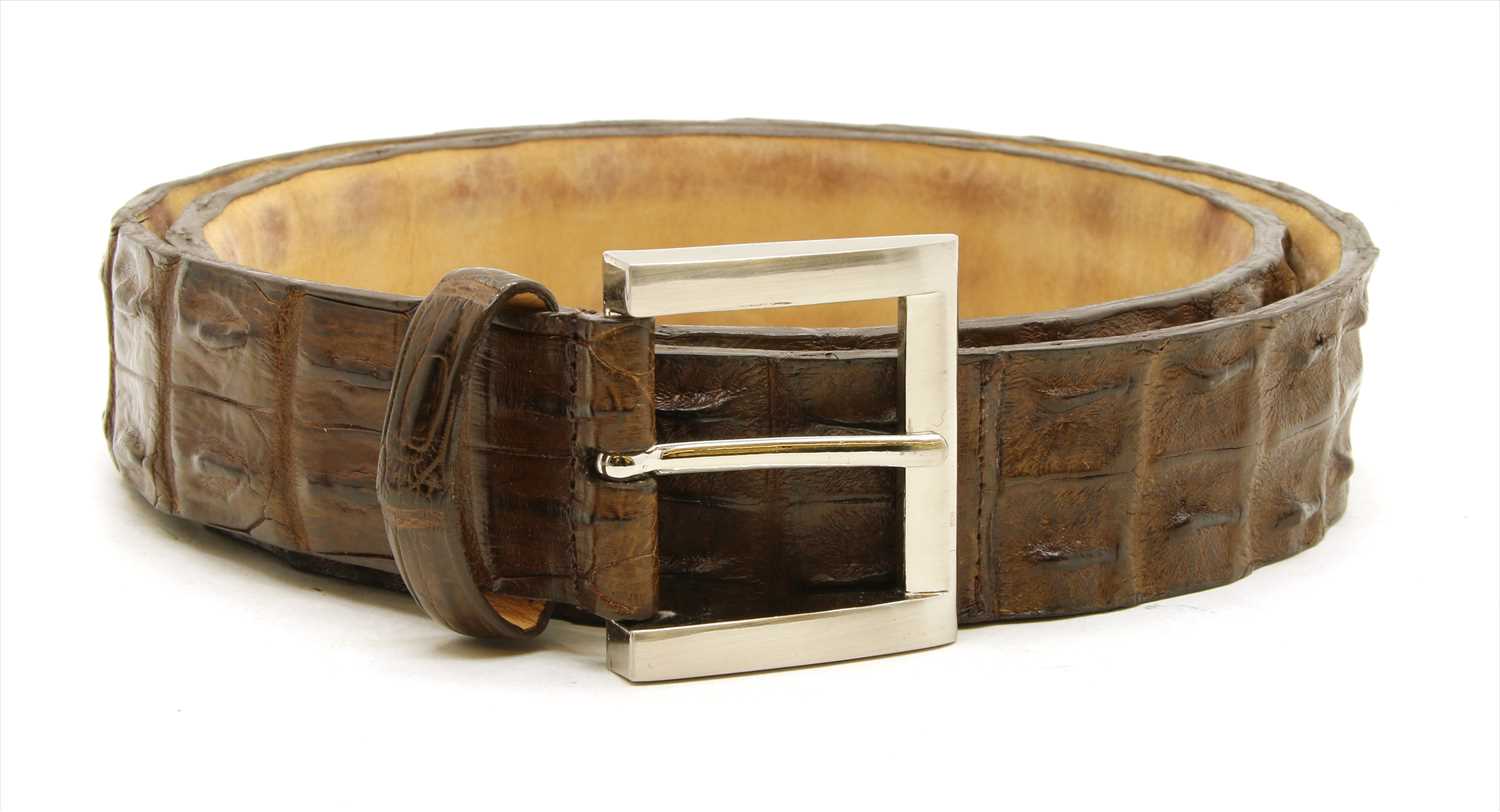 Lot 1141 - A Pickett of London gentleman's brown hornback crocodile belt