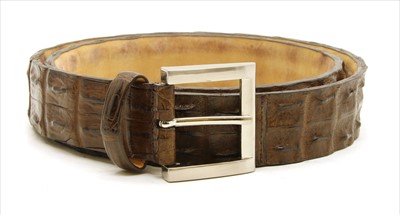 Lot 1141 - A Pickett of London gentleman's brown hornback crocodile belt