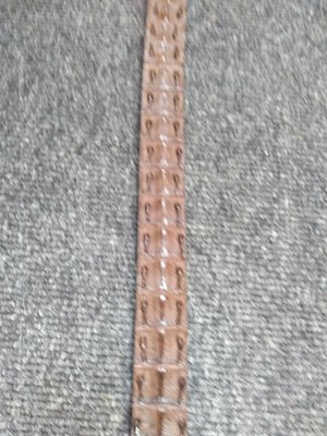 Lot 1141 - A Pickett of London gentleman's brown hornback crocodile belt