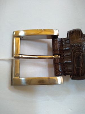 Lot 1141 - A Pickett of London gentleman's brown hornback crocodile belt
