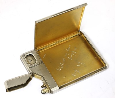 Lot 74 - A rare silver combination cigarette case