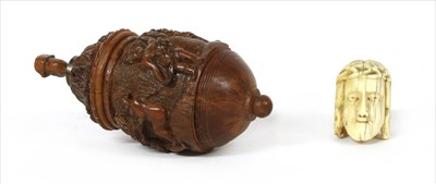 Lot 217a - A carved ivory memento mori