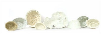Lot 331A - A collection of pottery and other jelly moulds