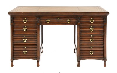 Lot 69 - A walnut desk