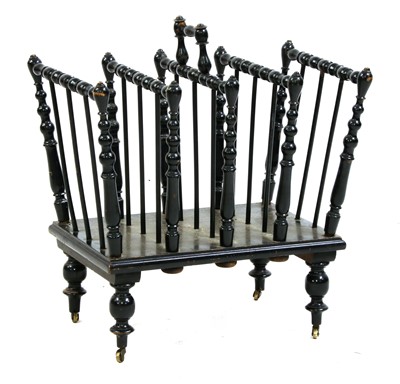 Lot 50 - An ebonised and turned four-division canterbury
