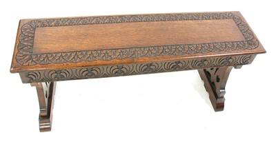 Lot 9 - An Arts & Crafts oak bench