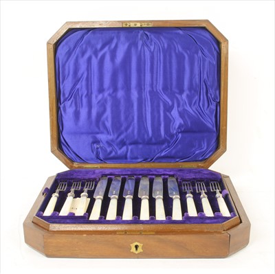 Lot 132 - A mahogany cased set of silver dessert knives and forks