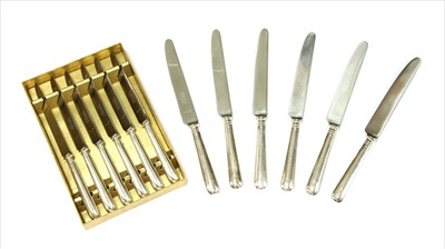 Lot 40 - A cased set of six old English pattern silver handle table knives
