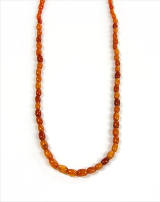 Lot 18 - A single row amber bead necklace