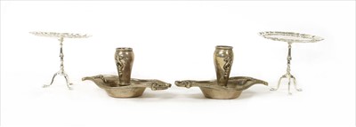 Lot 144 - A pair of silver white metal chamber sticks
