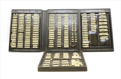 Lot 154A - A cased mould guide set of porcelain teeth
