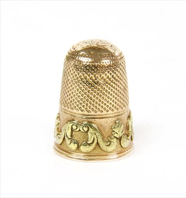 Lot 19A - A bi-colour gold thimble