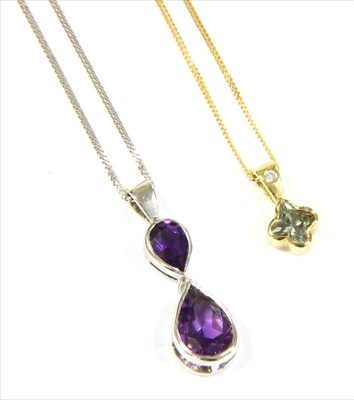 Lot 133 - An 18ct gold green sapphire and diamond pendant