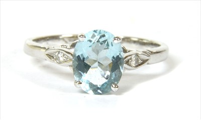 Lot 121 - A 9ct white gold aquamarine and diamond ring