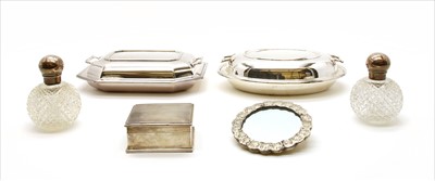Lot 47 - A pair of cut glass and silver scent bottles